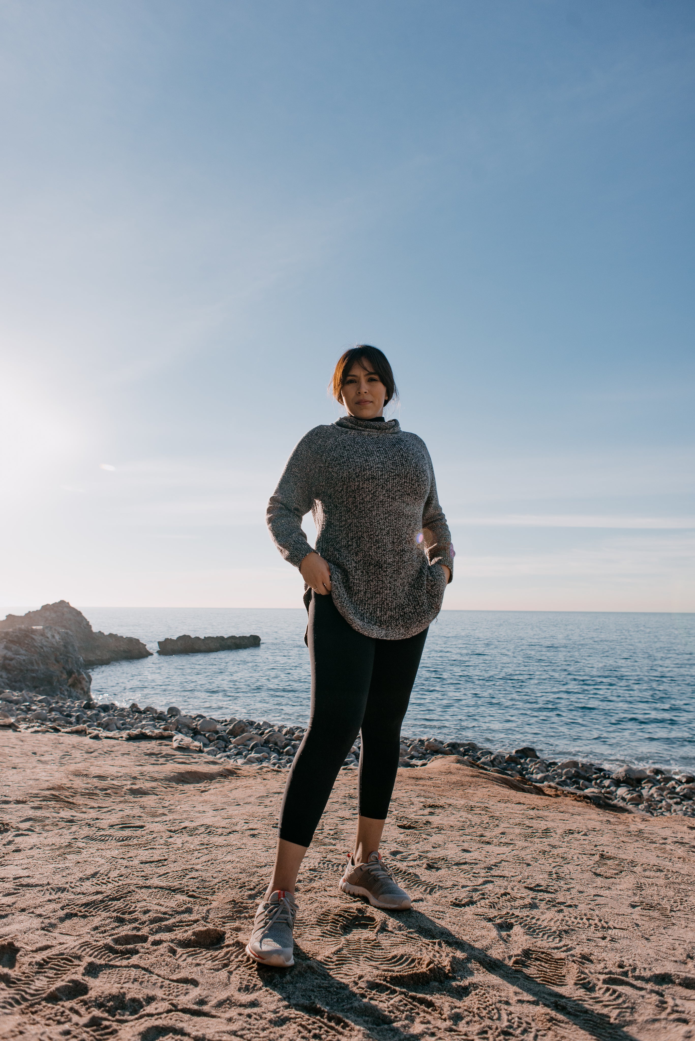 files/woman-in-sports-clothes-stands-on-a-beach-in-the-morning-light_166a134c-b354-4d49-bb56-140778180926.jpg
